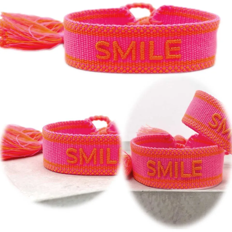 Canvas Smile Statement Armband Stoff Neon Pink Orange Quasten