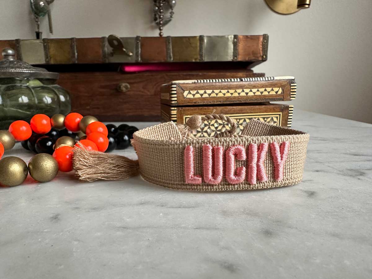LS-LebenStil Lucky Statement Armband Stoff Beige Rosa Quasten