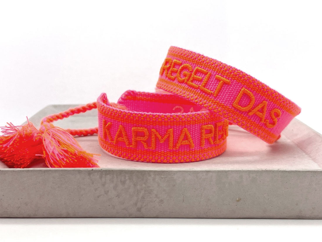 LS-LebenStil Karma Statement Armband Neon Pink Orange Quasten