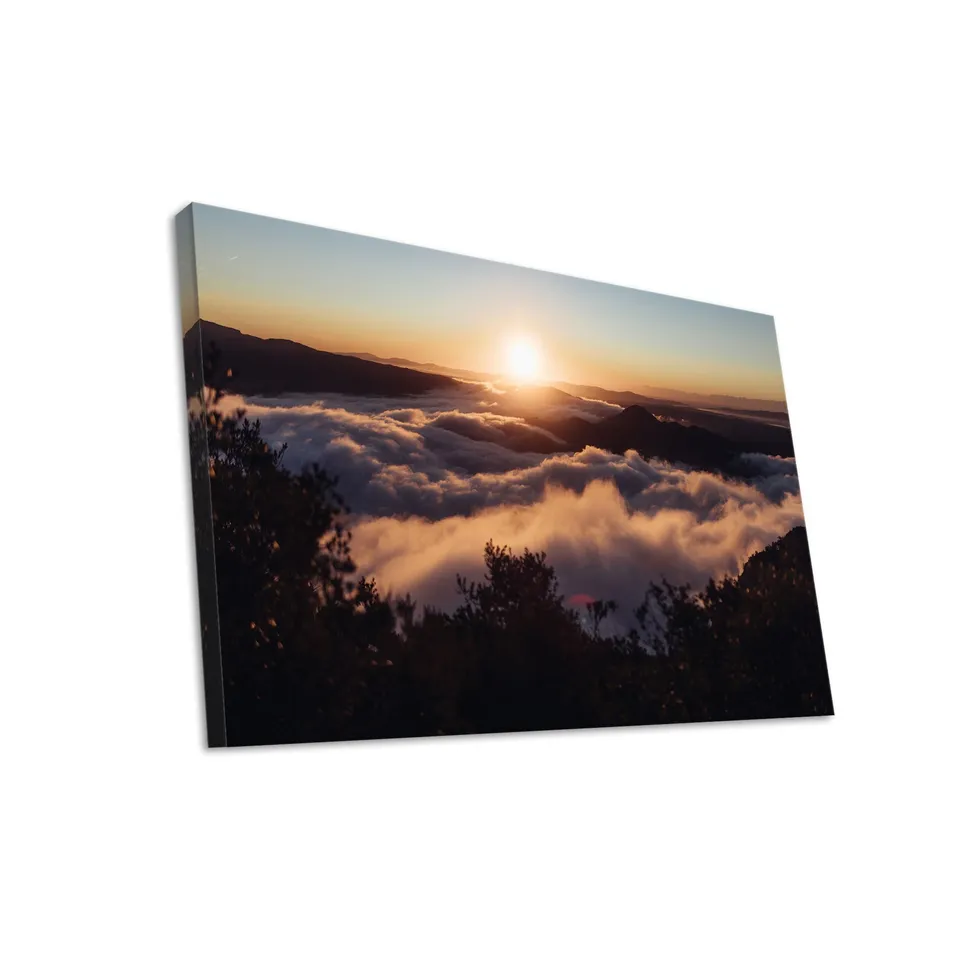 Hustling Sharks Wandbilder Sonnenaufgang über den Wolken 40x30 Bild