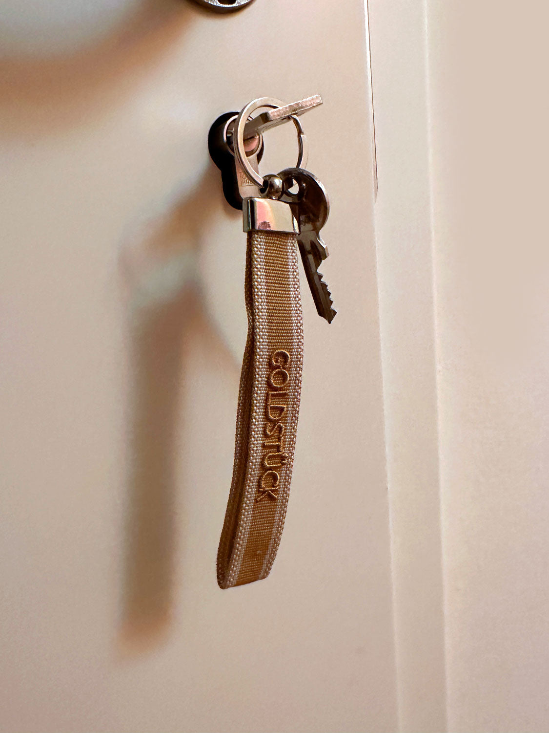 LS-LebenStil Goldstück Schlüsselanhänger Stoff beige gold